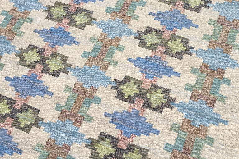 Judith Johansson, a carpet 'Riddarsporrar', flat weave, c. 245 x 177 cm, signed JJ E.