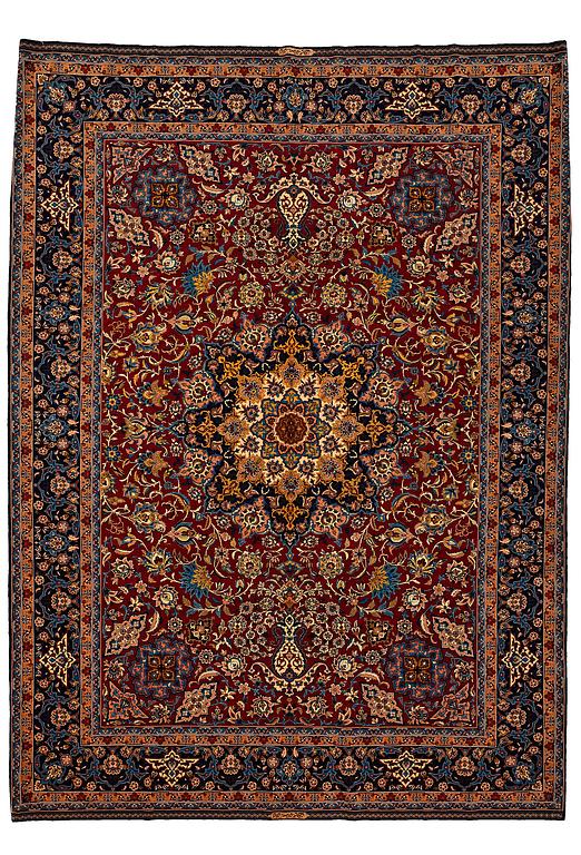 A CARPET, an old Isfahan, ca 347 x 252 cm (+ the ends have 3 and 2,5 cm flat weave).