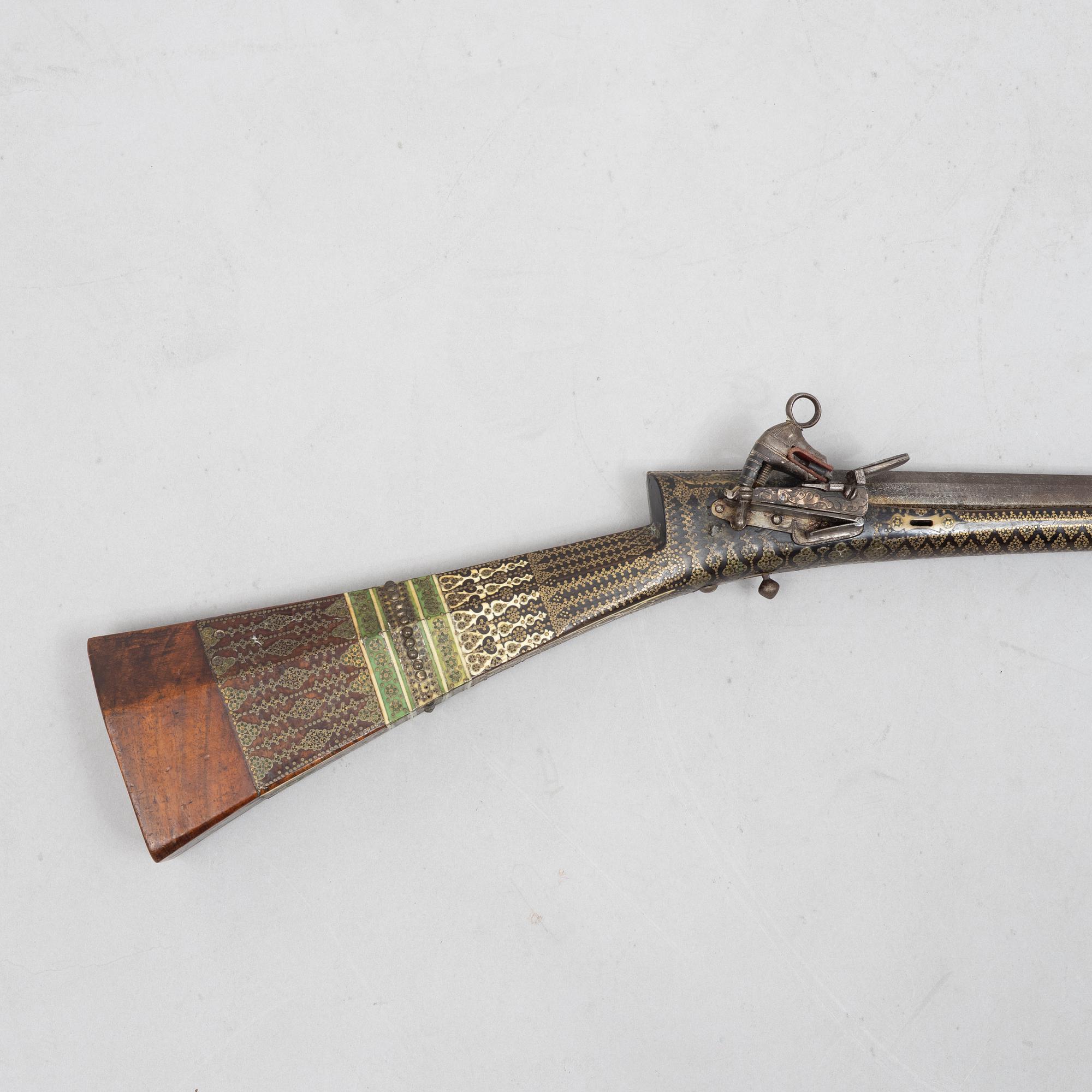 A Persian snaphaunce rifle, 18th century.