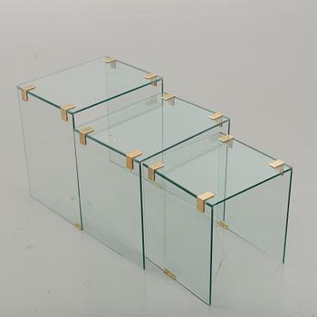 A GLASS NESTING TABLE 1900/2000.