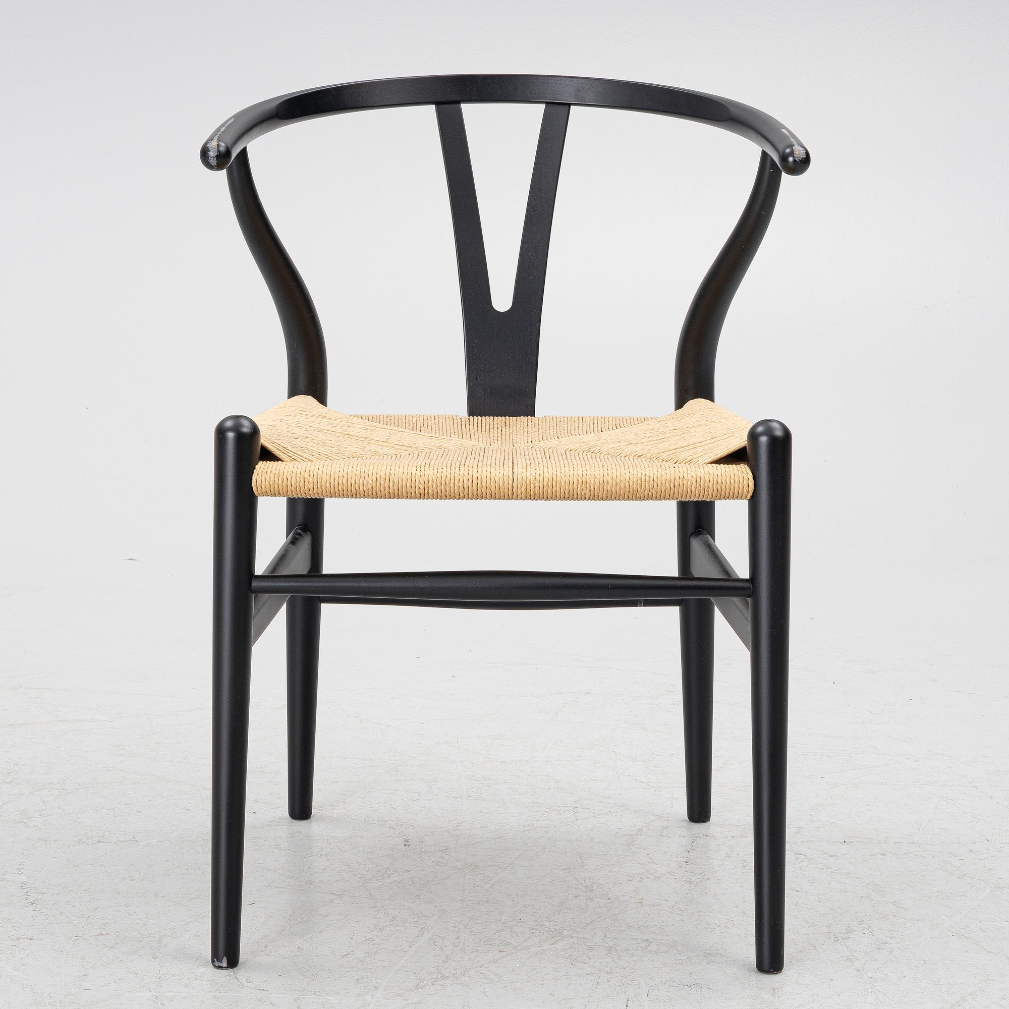 Hans J. Wegner, a model CH-24/'Wishbone' chair, Carl Hansen, Denmark, 21st century.