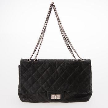 CHANEL Caviar Reissue 2.55 Jumbo Single Flap Bag.