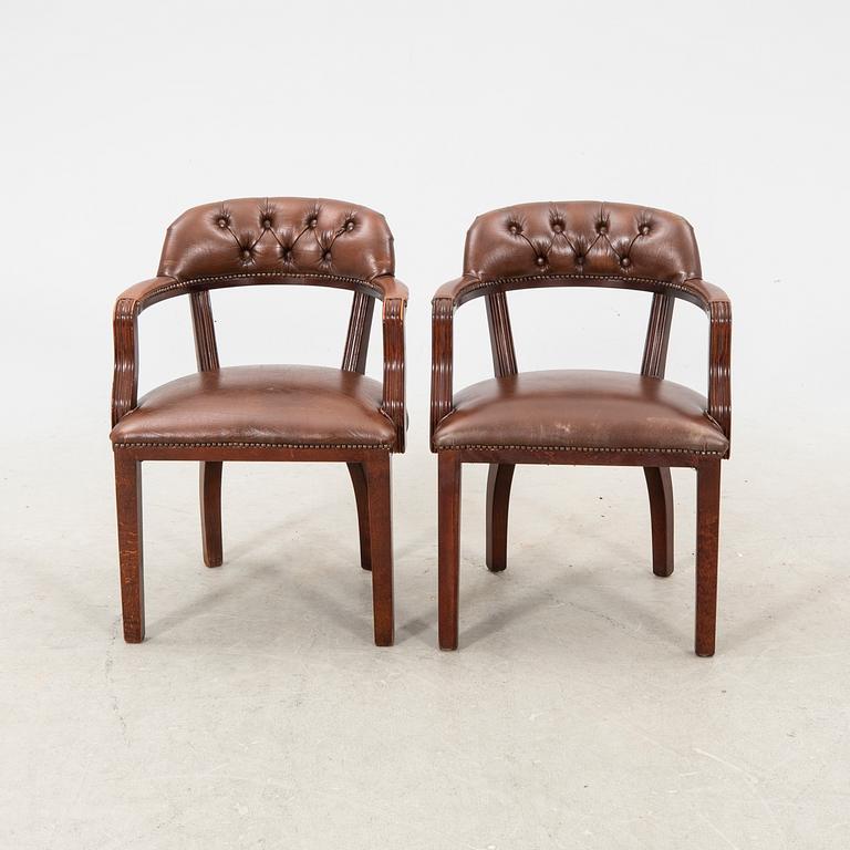 A pair of leather armchairs from the second half of the 20th century.