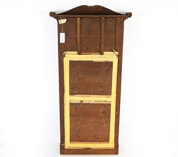 A 19th Century mahogany mirror with a console table.
