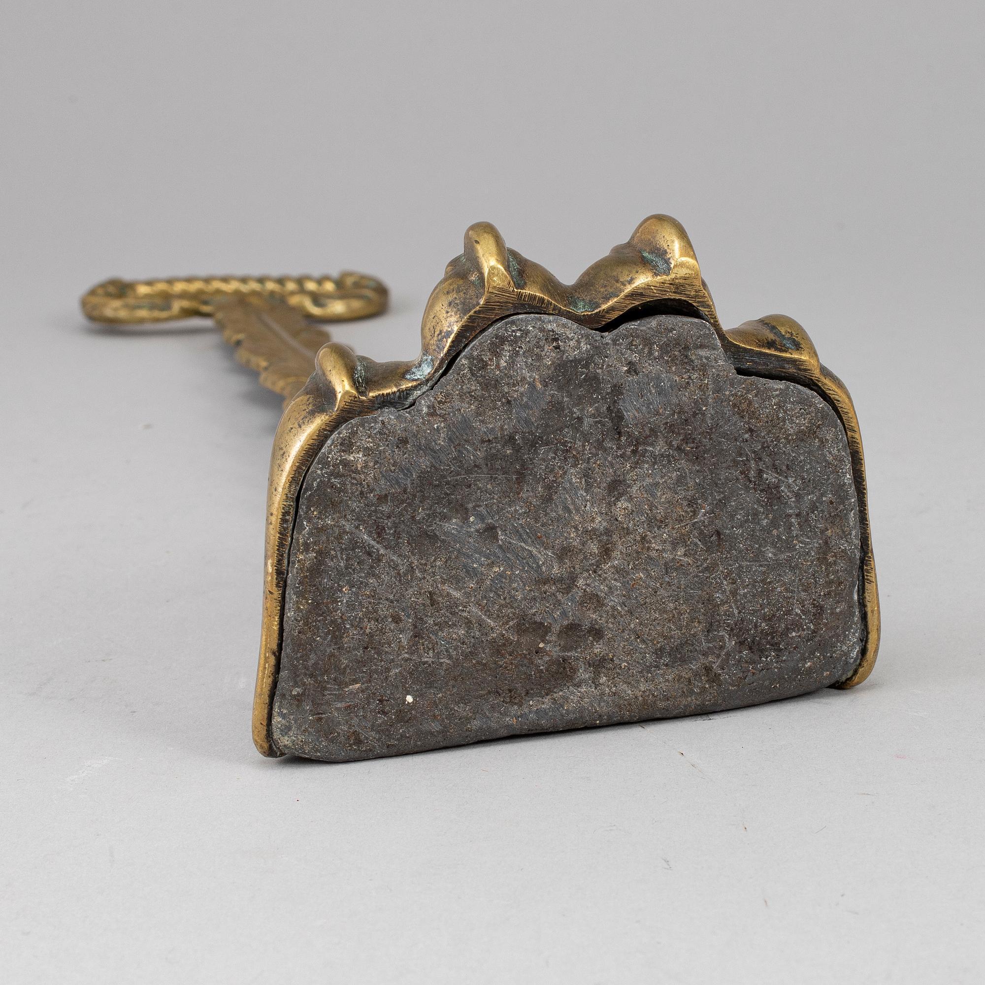 A 19th century bronze door stop.