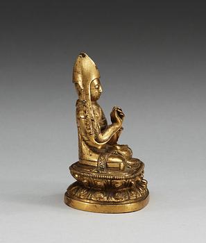A gilt-bronze seated figure of a Lama, presumably Second Khalka Jetsun Dampa, Mongolia, presumably 18th Century.