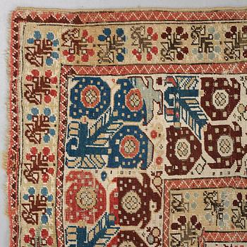 A RUG, an antique Gördes (Ghiordes) prayer rug, second half of the 18th century, ca 167-170 x 120-123 cm.