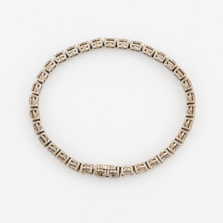 Armband 14K vitguld med runda briljantslipade diamanter.