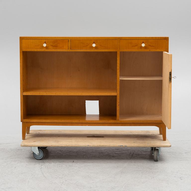 A bookcase with cabinet, 1930s/40s.