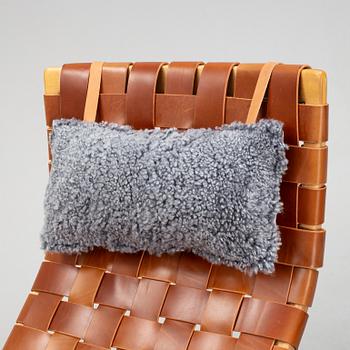 A 'Pernilla 3' lounge chair by Bruno Mathsson for Firma Karl Mathsson, dated 1973.