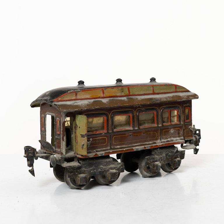 Model train with track and station building, 13 pieces, Germany, 1920s.