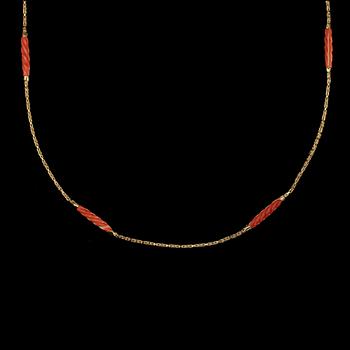 A coral necklace.