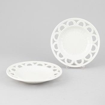 Gunnar Nylund, a set of 14 stoneware pot and plates and a vase/candle holder, Rörstrand.
