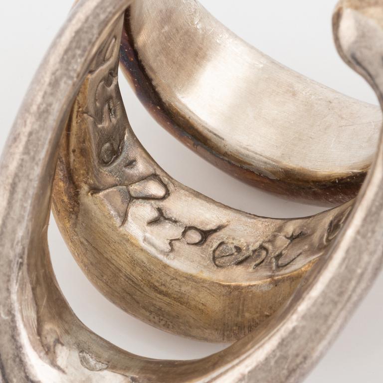 Two silver rings.