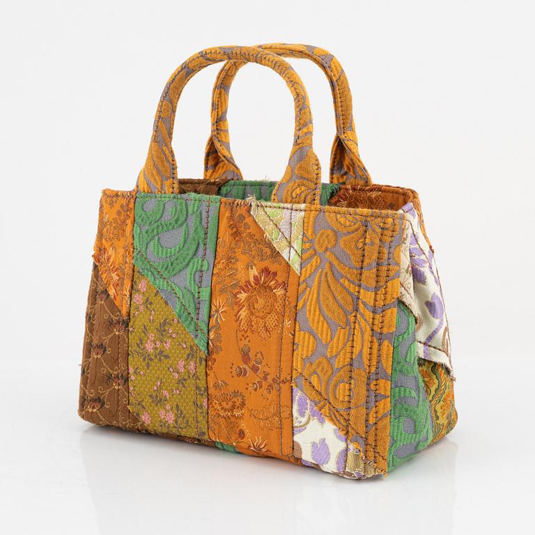 Prada, a embroidered silk 'Broccato patch' bag.