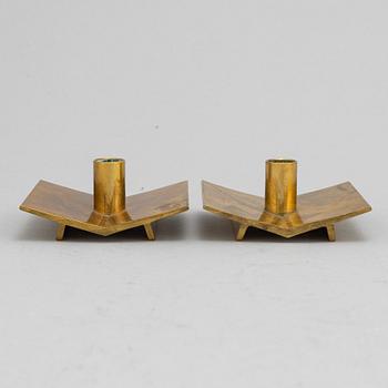 Pierre Forssell, a set of five brass 'Profil' candlesticks from Skultuna.