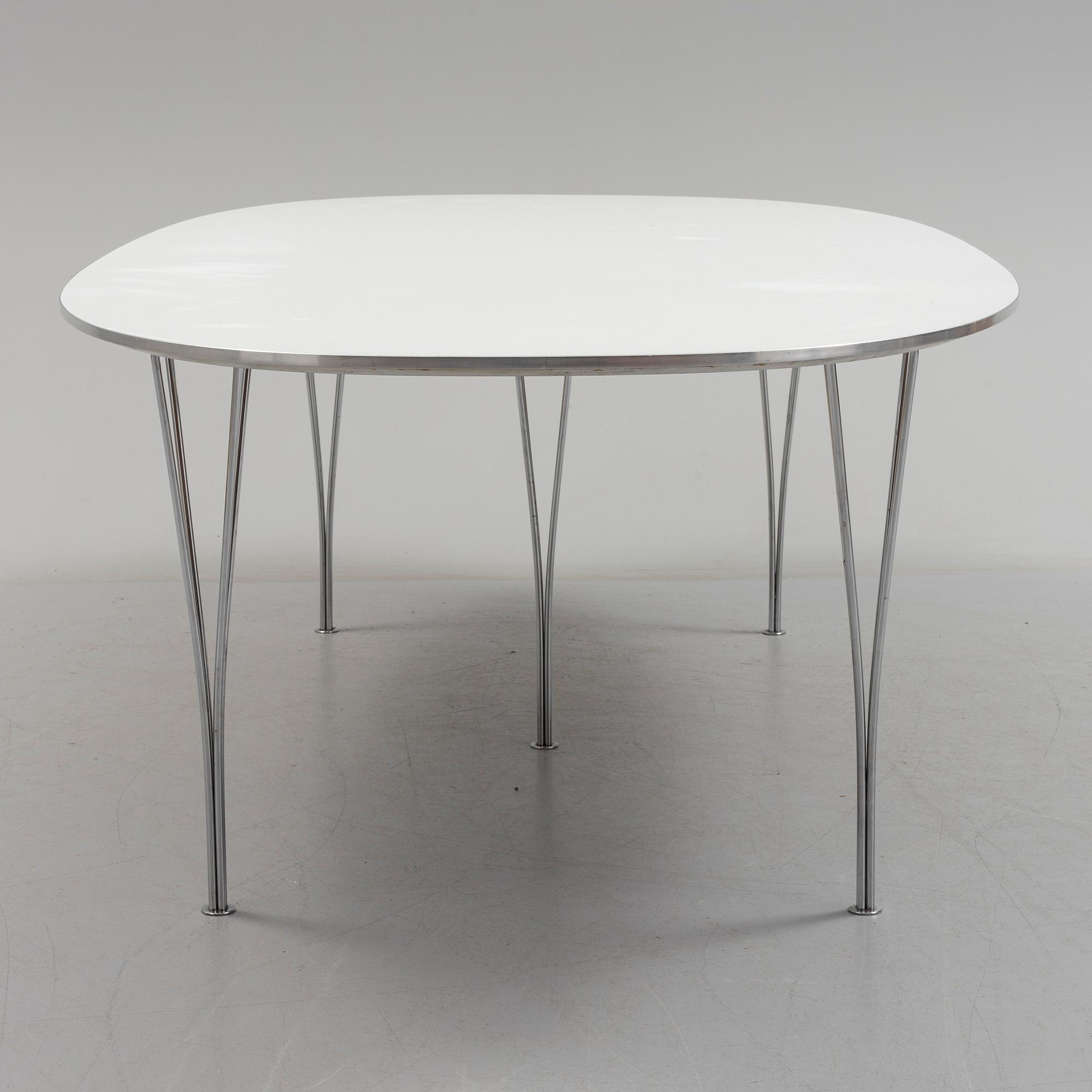 A "Superellips" table by Bruno Mathsson and Piet Hein for Fritz Hansen.