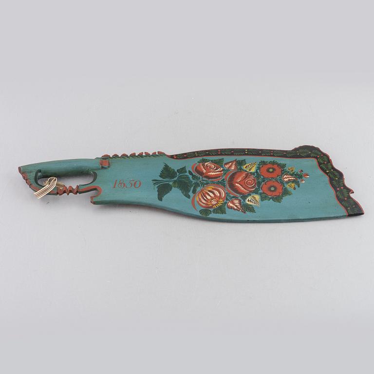 A carved and polychrome painted folk art wedding gift by P. Schenler, Hälsingland, Sweden, dated 1843.