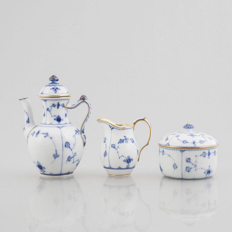 A "Blue fluted"/"Musselmalet riflet" porcelain mocha pot, a sugar box with cover and a creamer, Royal Copenhagen, 19th c.