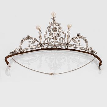 A platinum tiara/necklace combination set with old-cut diamonds and pearls.