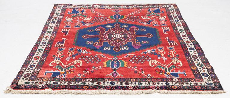 An oriental rug, c. 230 x 160 cm.