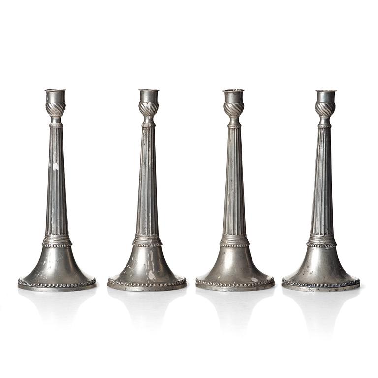 A set of four Swedish late Gustavian pewter candlesticks by E P Krietz, made in Stockholm.