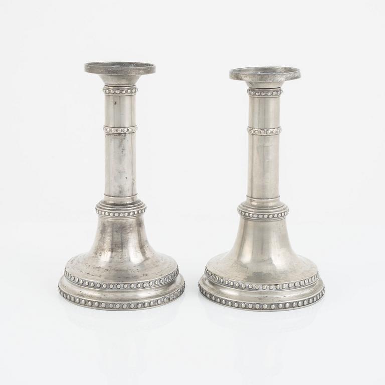 A pair of late Gustavian candlesticks, circa 1900.