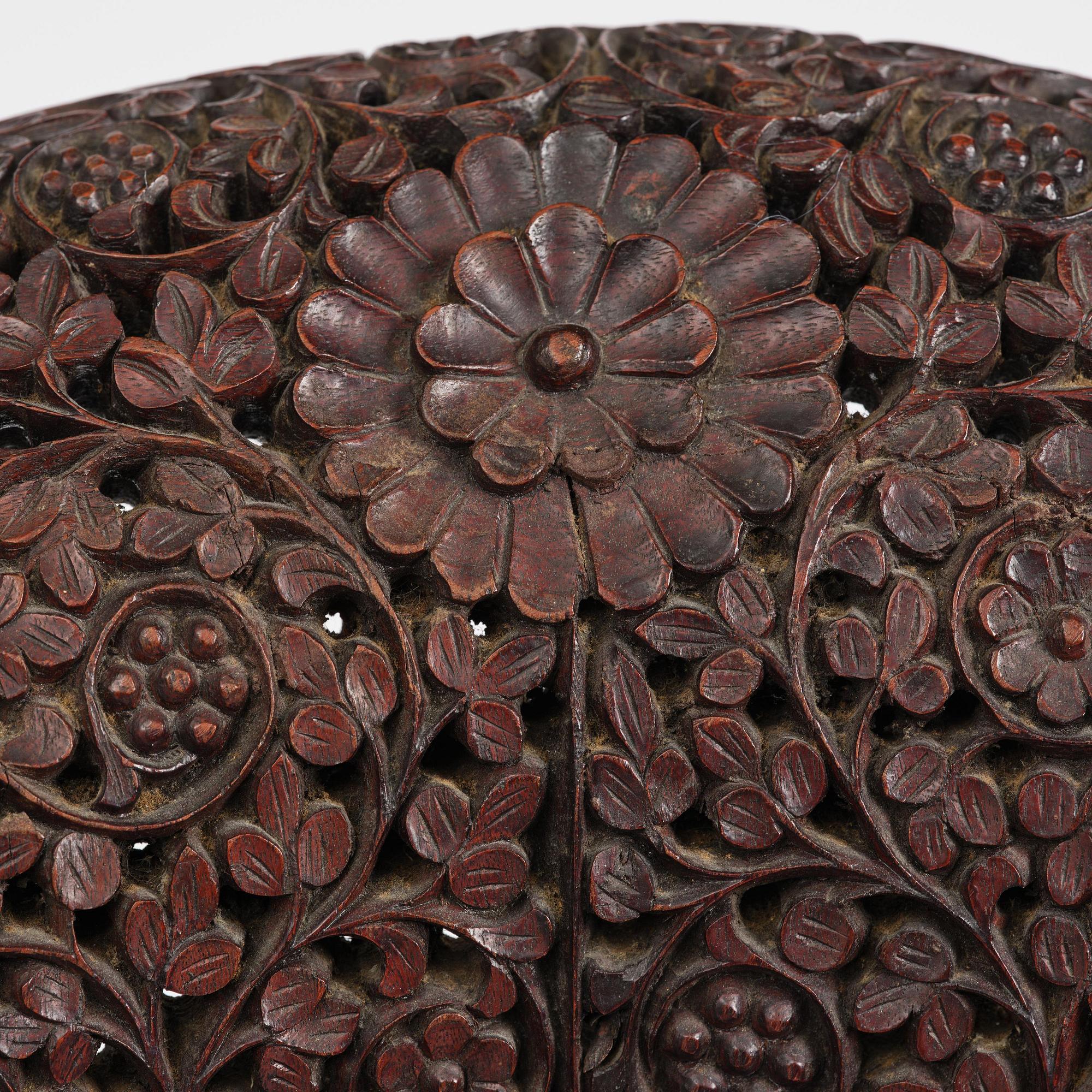 A pair of carved 'blackwood' armchairs, Bombay presidency, British Raj, circa 1880.