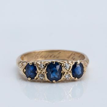 A sapphire and old-cut diamond ring, 1908.