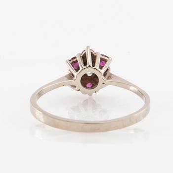 Ring 14K white gold set with a round brilliant-cut diamond and faceted rubies, Finland 1975.