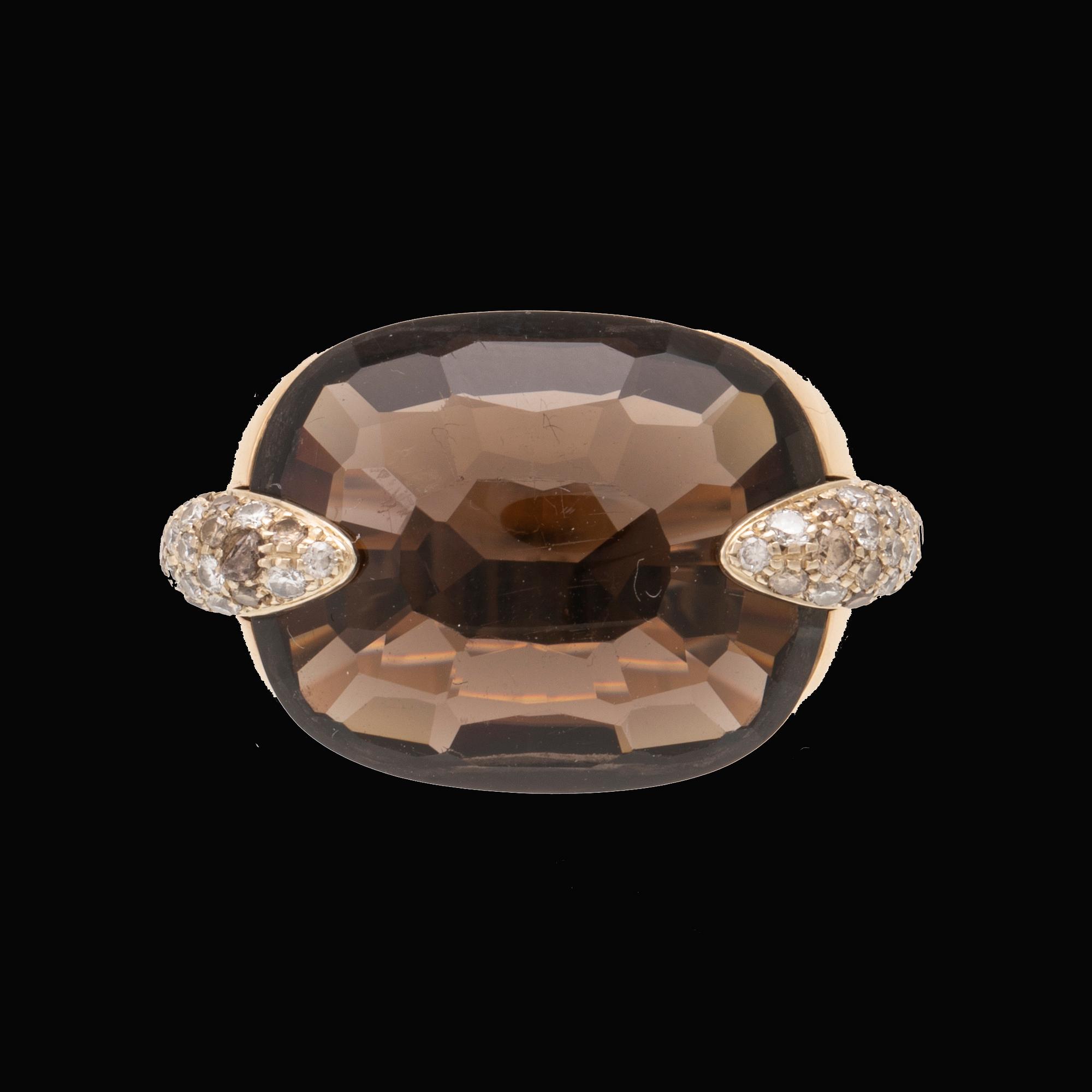 An 18K gold Pomellato "Pin Up" ring set with smoky quartz and round brilliant-cut diamonds.