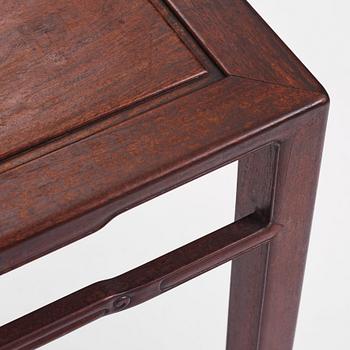 A Chinese hardwood corner-leg table, Qing dynasty.