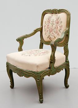 A Rococo 18th century armchair.