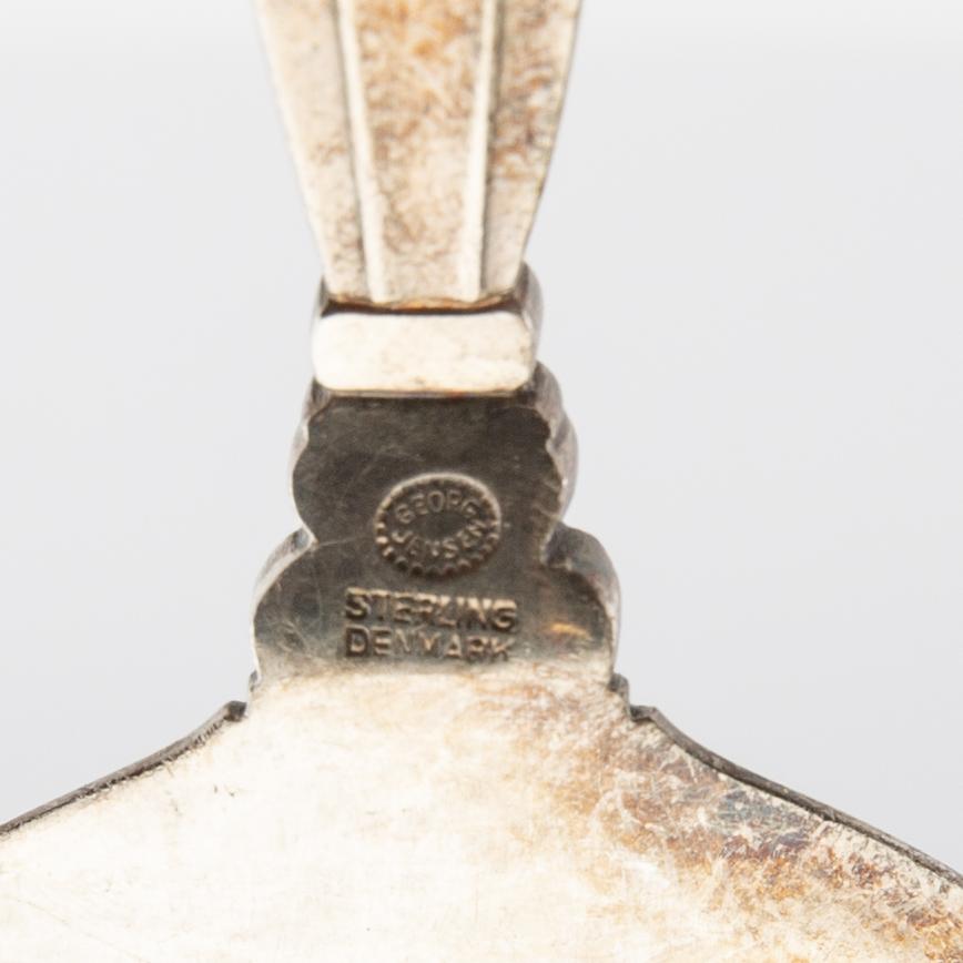 Johan Rohde, flasköppnare och tårtspade "Konge/Achorn" sterlingsilver för Georg Jensen efter 1945.