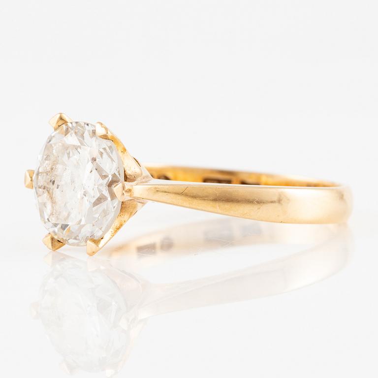 Ring 18K gold with a round brilliant-cut diamond.