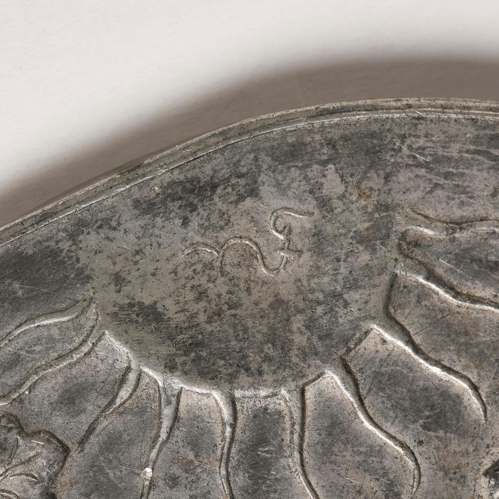 Nils Fougstedt, a pewter hand mirror model A 508, Firma Svenskt Tenn, Stockholm, 1920s-30s.