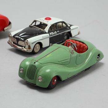 A collection of 6 tin toys, Schuco Akustico 2002, among others, circa mid 20th century.