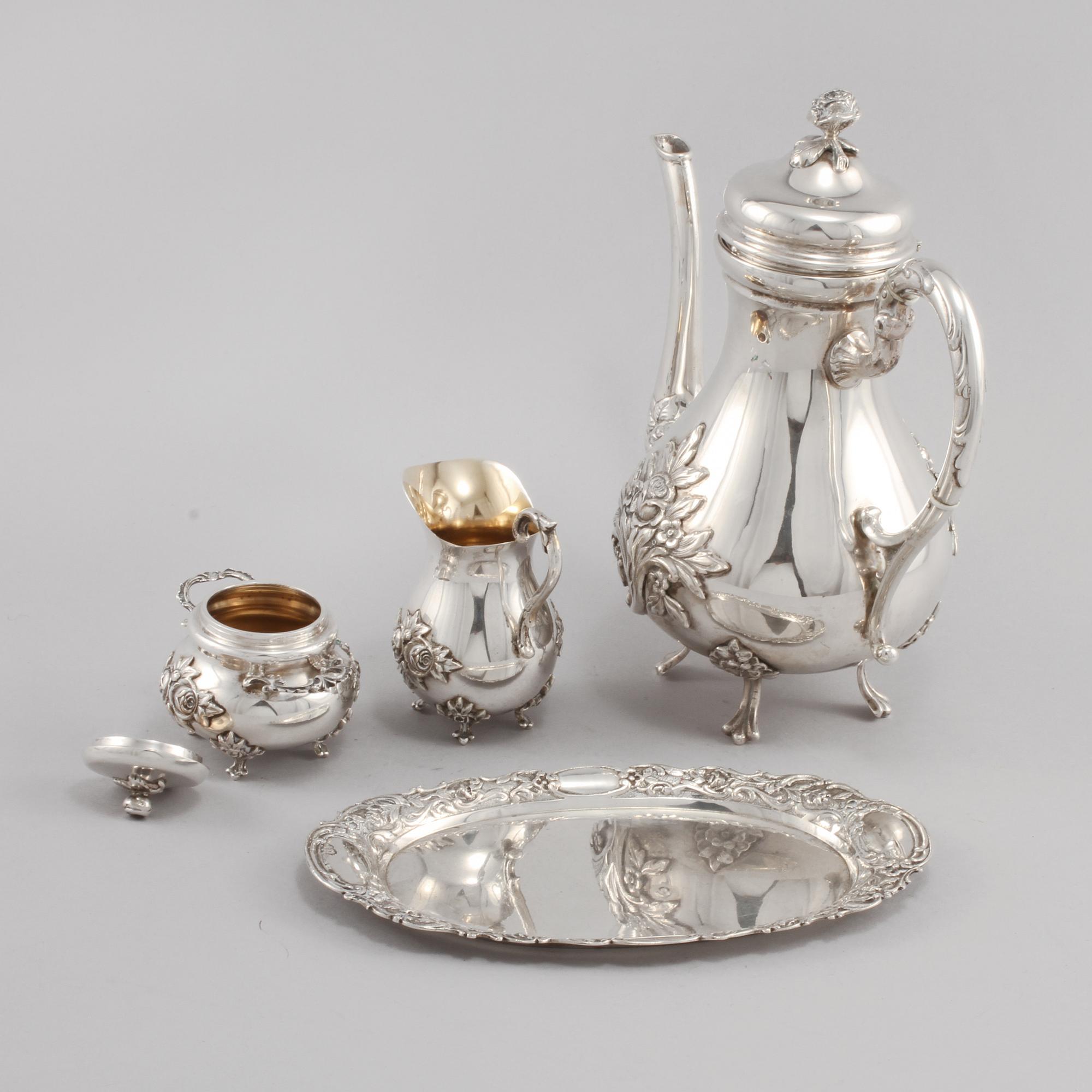 KAFFESERVIS, 4 delar, låghaltigt silver, 1900-tal, total vikt 1125 gram.