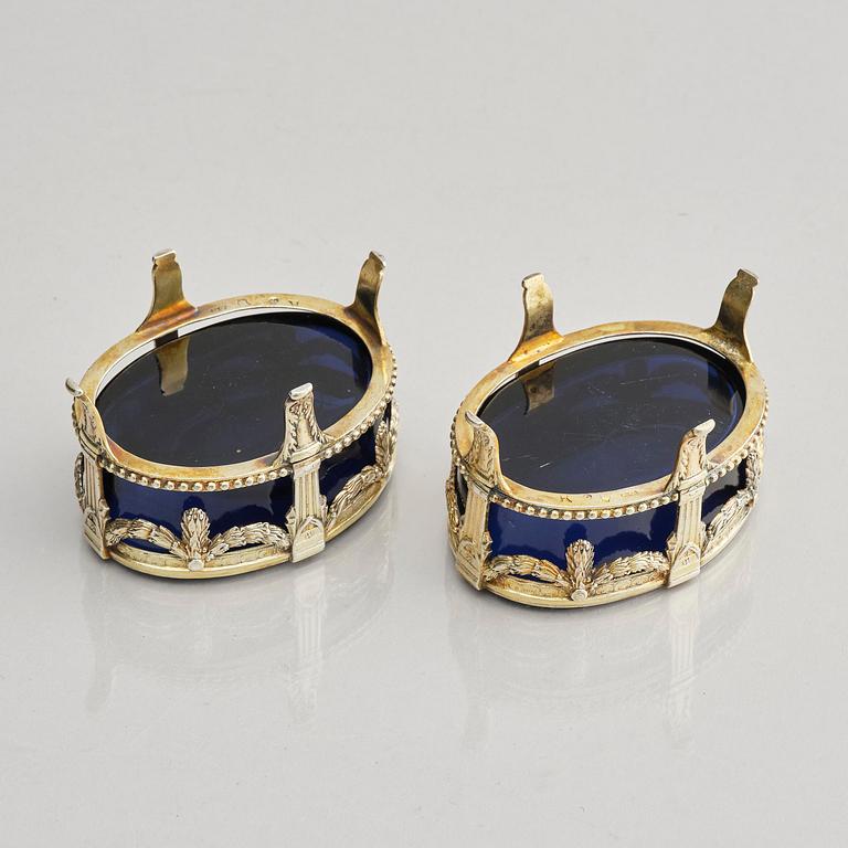A pair of Swedish 18th century silver and blue glass salt cellars, mark of Pehr Zethelius, Stockholm 1775.