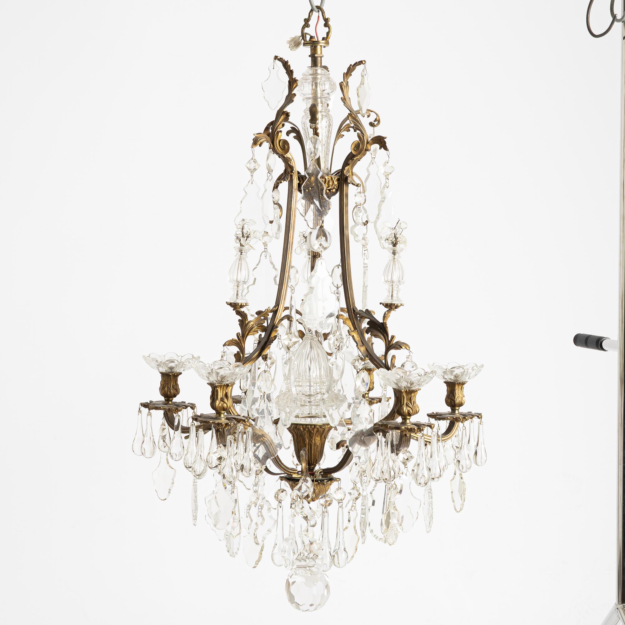 A six-branch rococ-style chandelier, first part 20th century.