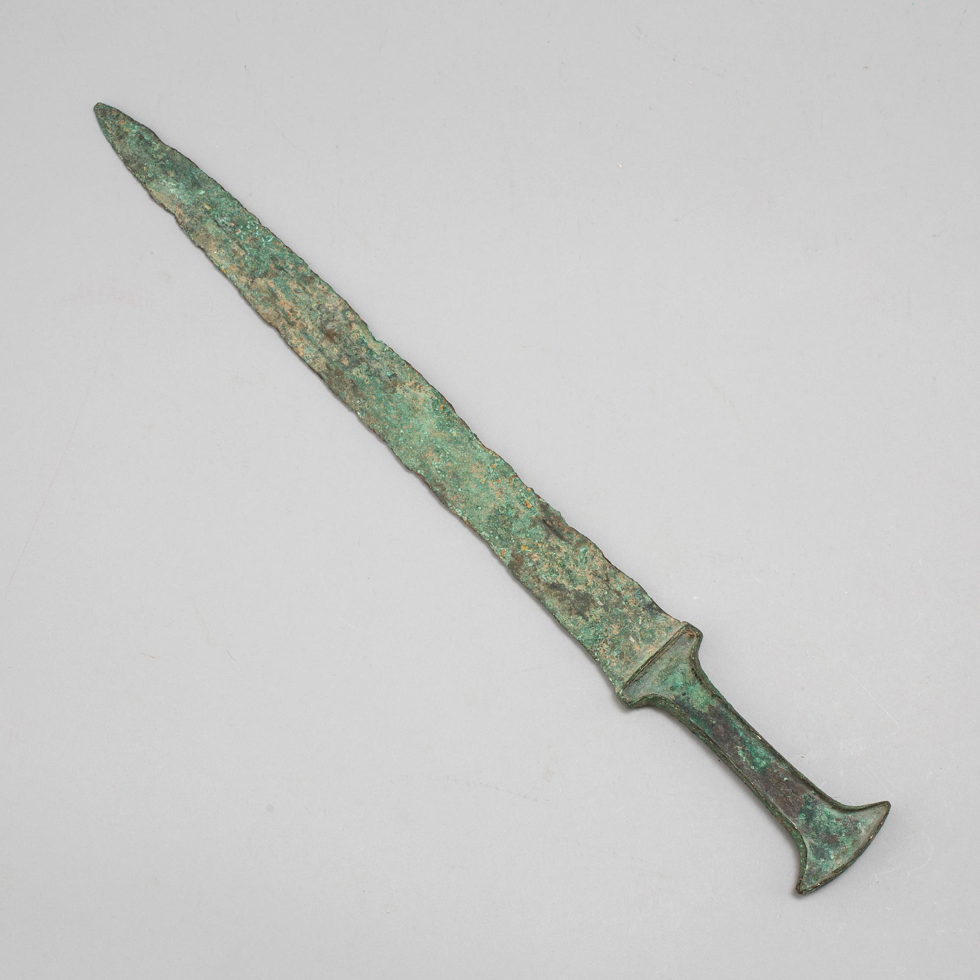 A Luristan bronze sword.