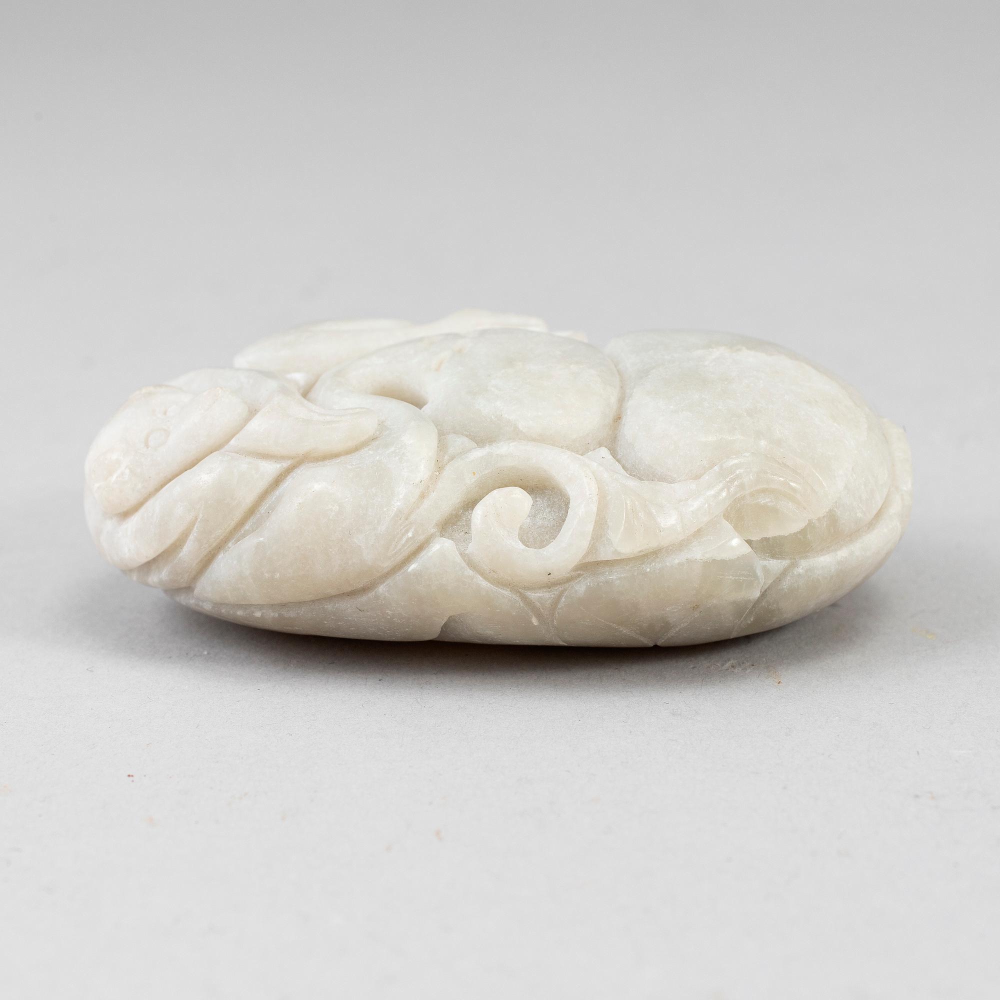 A Chinese carved sculpture of a monkey , louts and calebass fruit. 20th Century.
