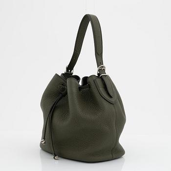 Bally, a gree leather handbag.