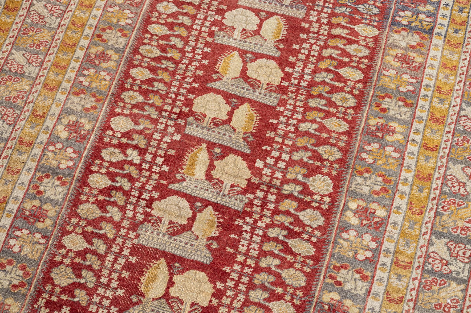 An oriental carpet, c. 195 x 70 cm.