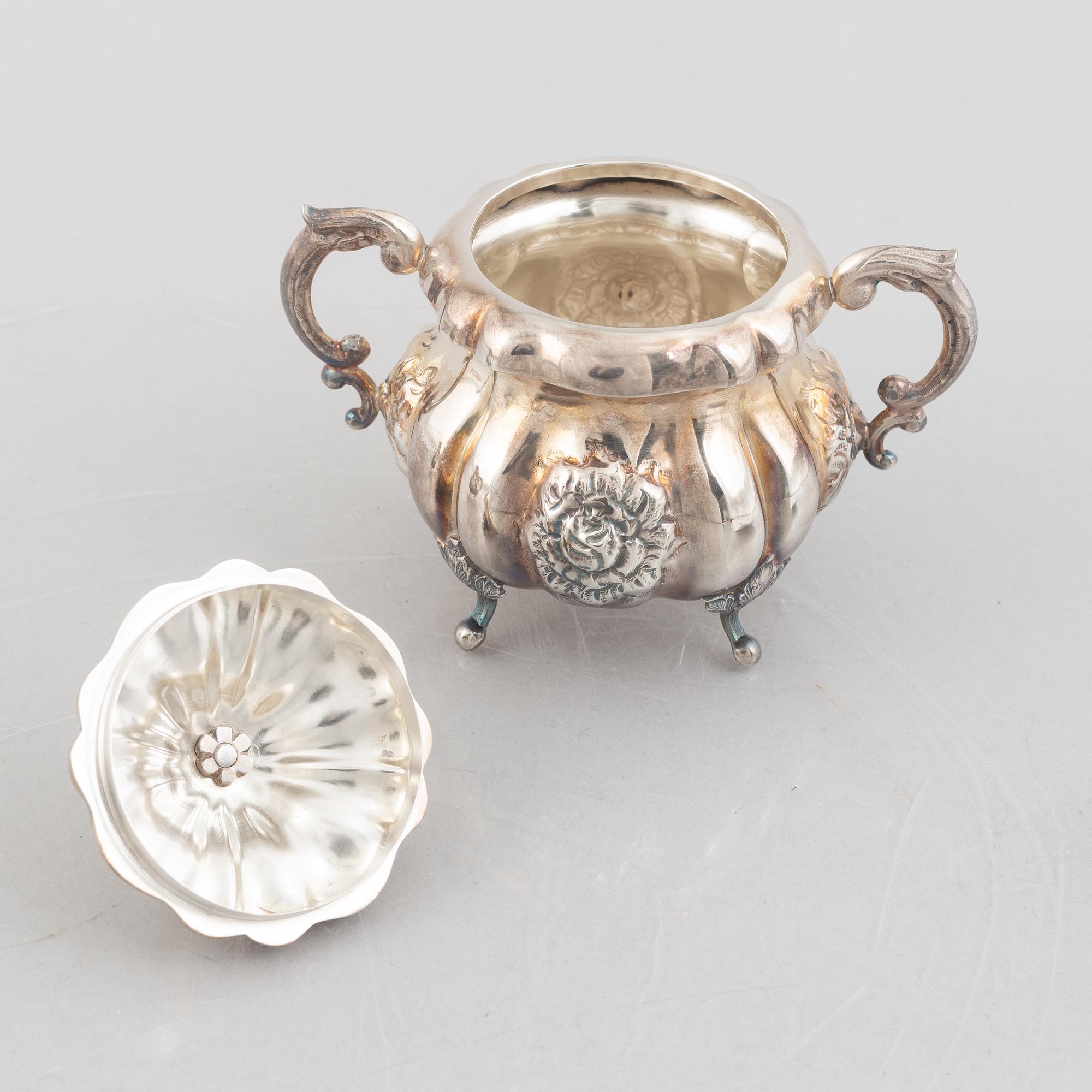 An Austrian silver coffee pot, tea pot, cream jug and sugar bowl, Vienna 1826.