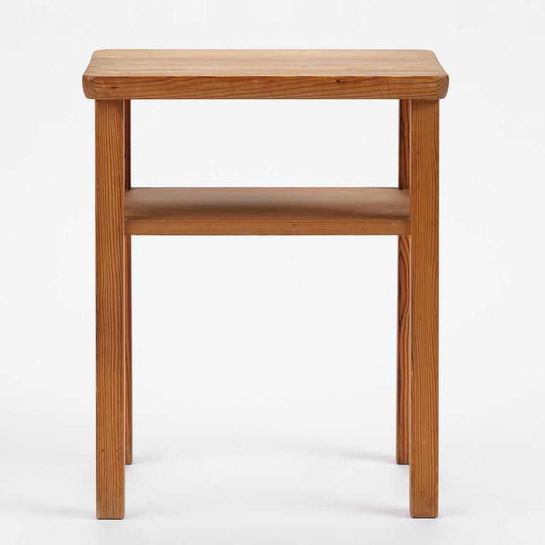 Axel Einar Hjorth, a stained pine "Värmdö" side table, Nordiska Kompaniet, 1930s.