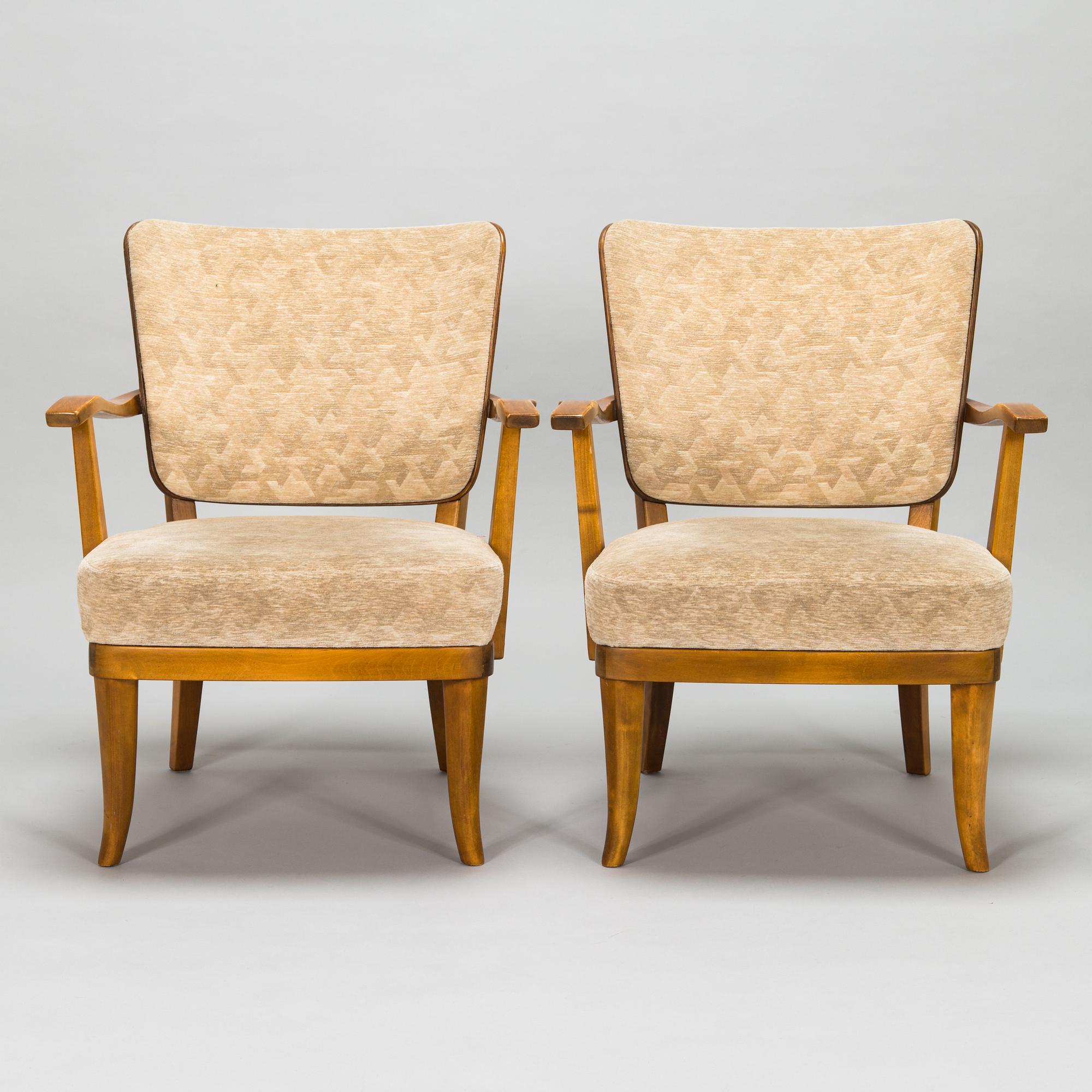 Einari Kyöstilä, a pair of 1940s open armchairs for Oy Stockmann Ab, Keravan Puusepäntehdas, Finland.