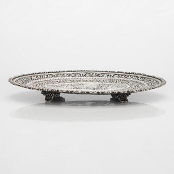 A silver salver, marked OM BHUJ for Oomersi Mawji, Bhuj, Kutch, India, circa 1860-1890.