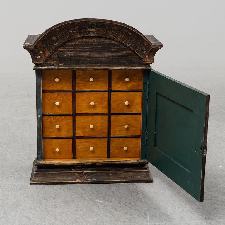 A circa 1900 small cabinet.