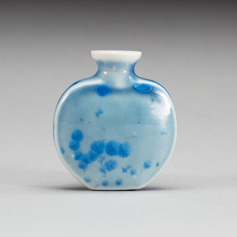 A iridescent blue glazed snuff bottle, 20th Century.